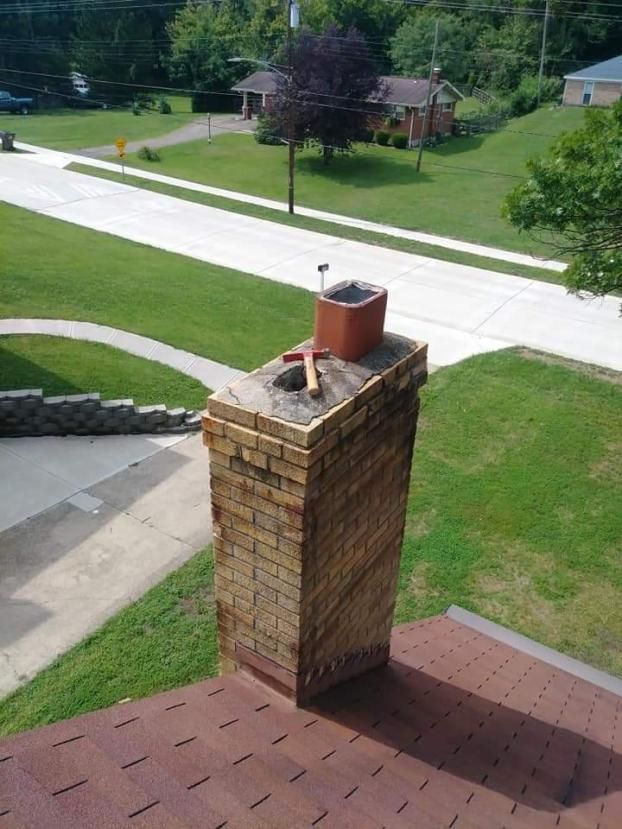 Before a completed chimney repairs project in the  area