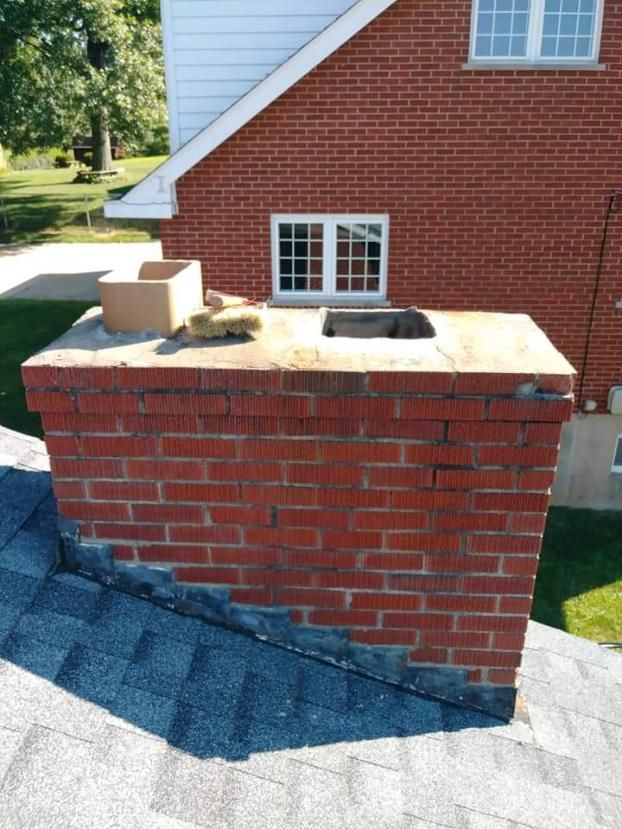 Before a completed chimney repair project in the  area