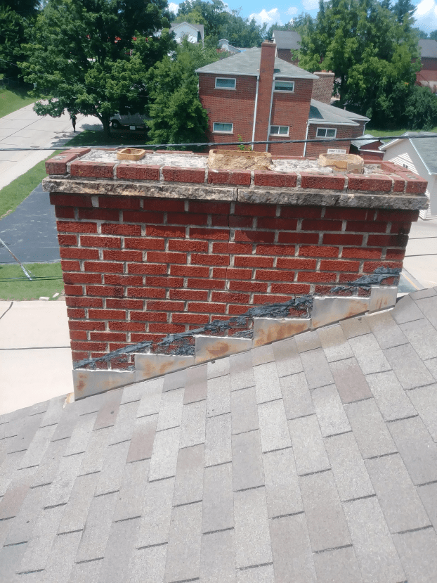 Before a completed chimney repairs project in the  area